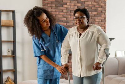 caregiver helping patient